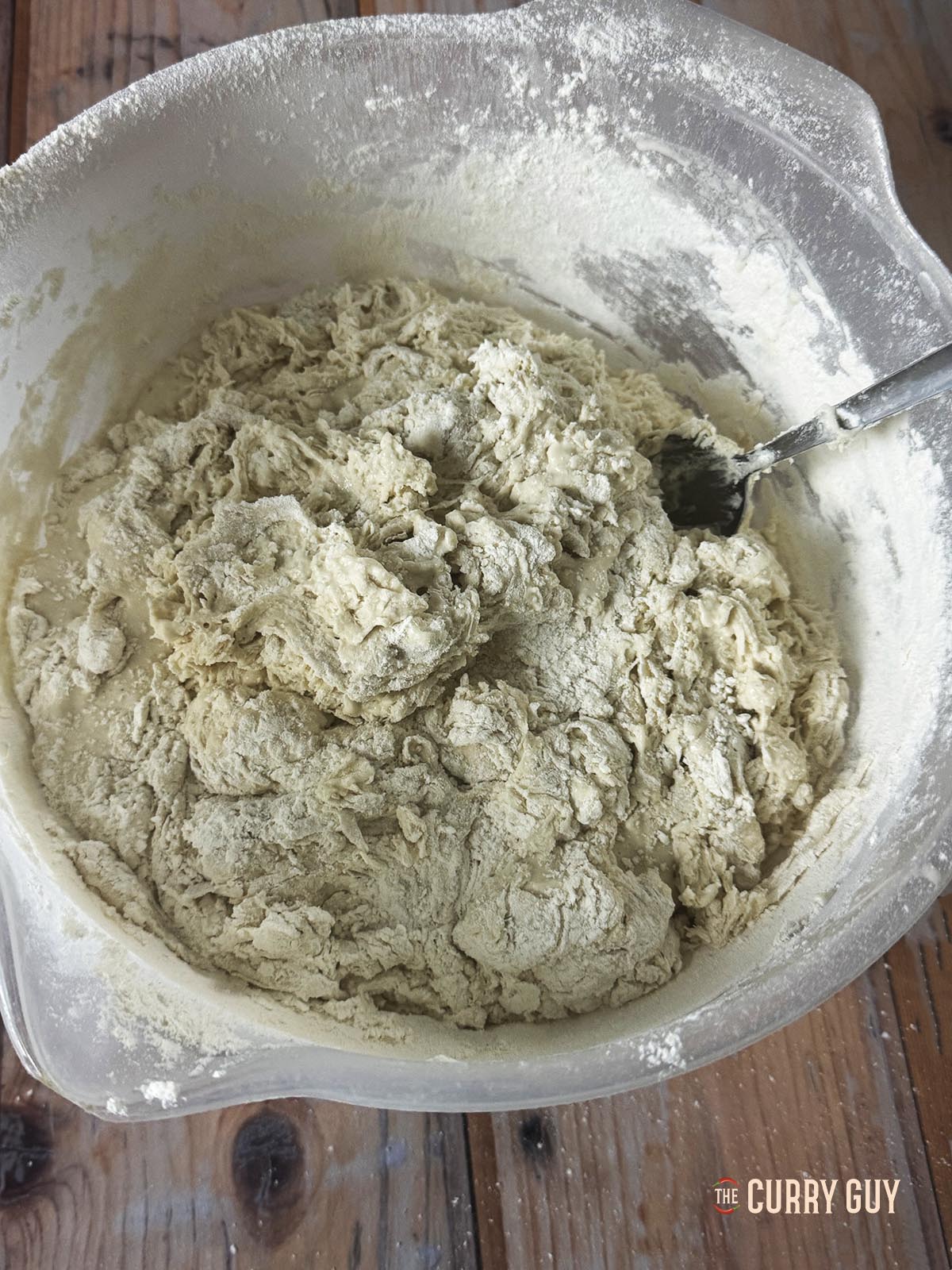 The dough in a mixing bowl. Still quite wet.