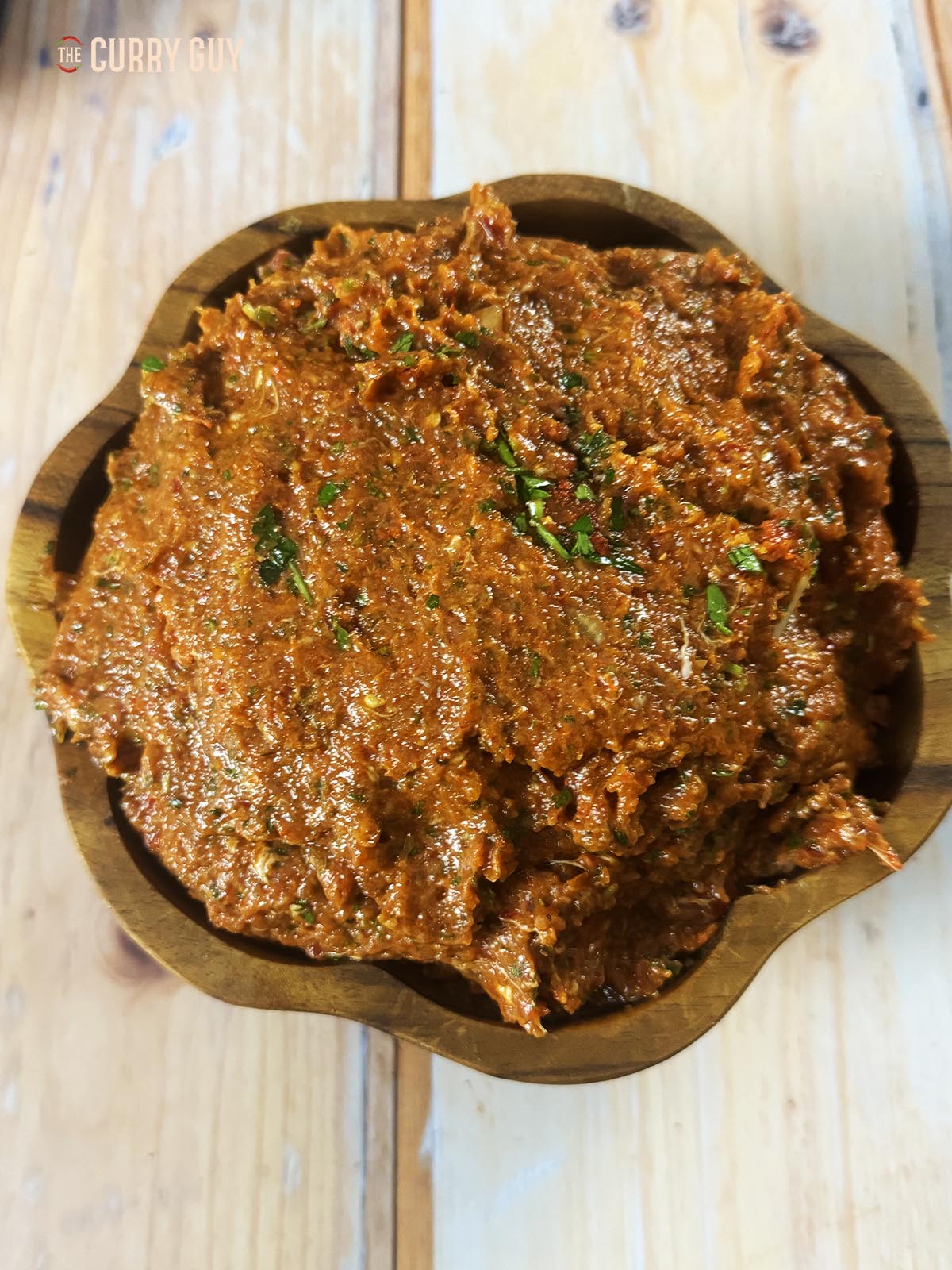 Meat paste ready to spread over the dough.