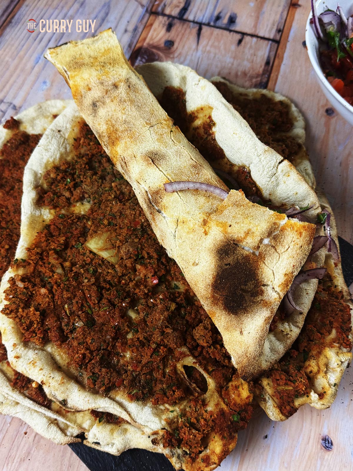 A rolled lahmacun.