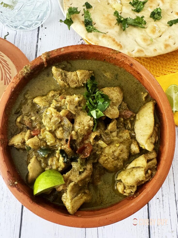 Spicy chicken curry with fresh green chillies and herbs.