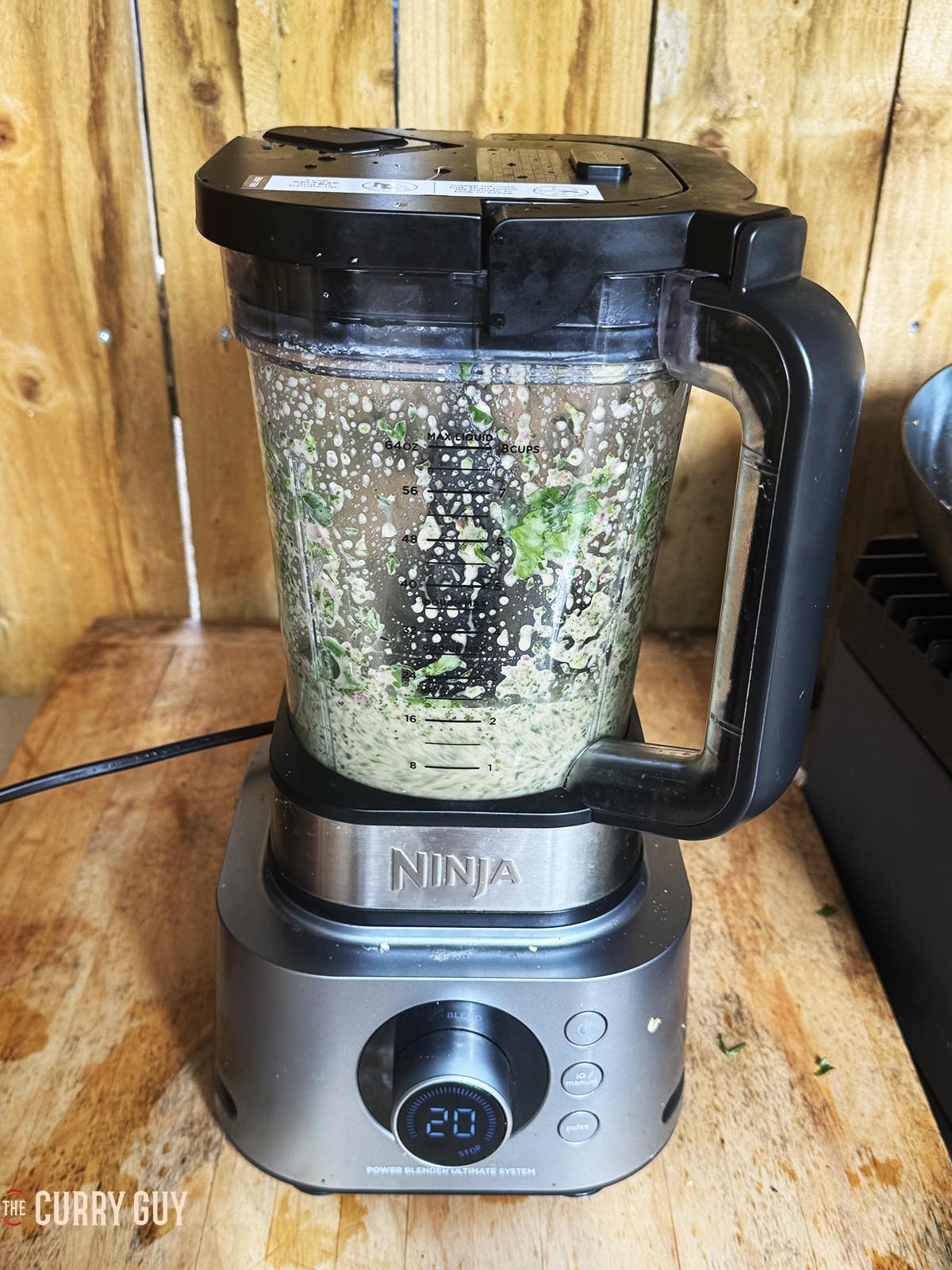 Blending the paste ingredients in a blender.