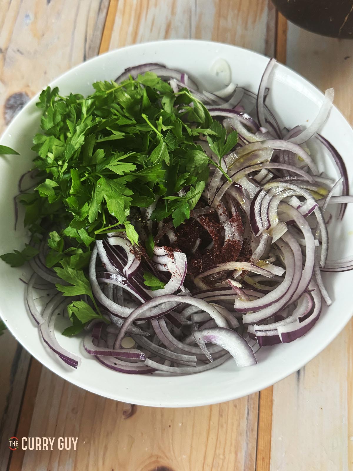 The ingredients for the salad in a mixing bowl. 