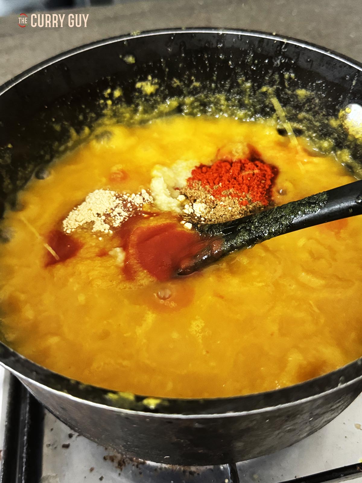 Stirring in the ground spices.