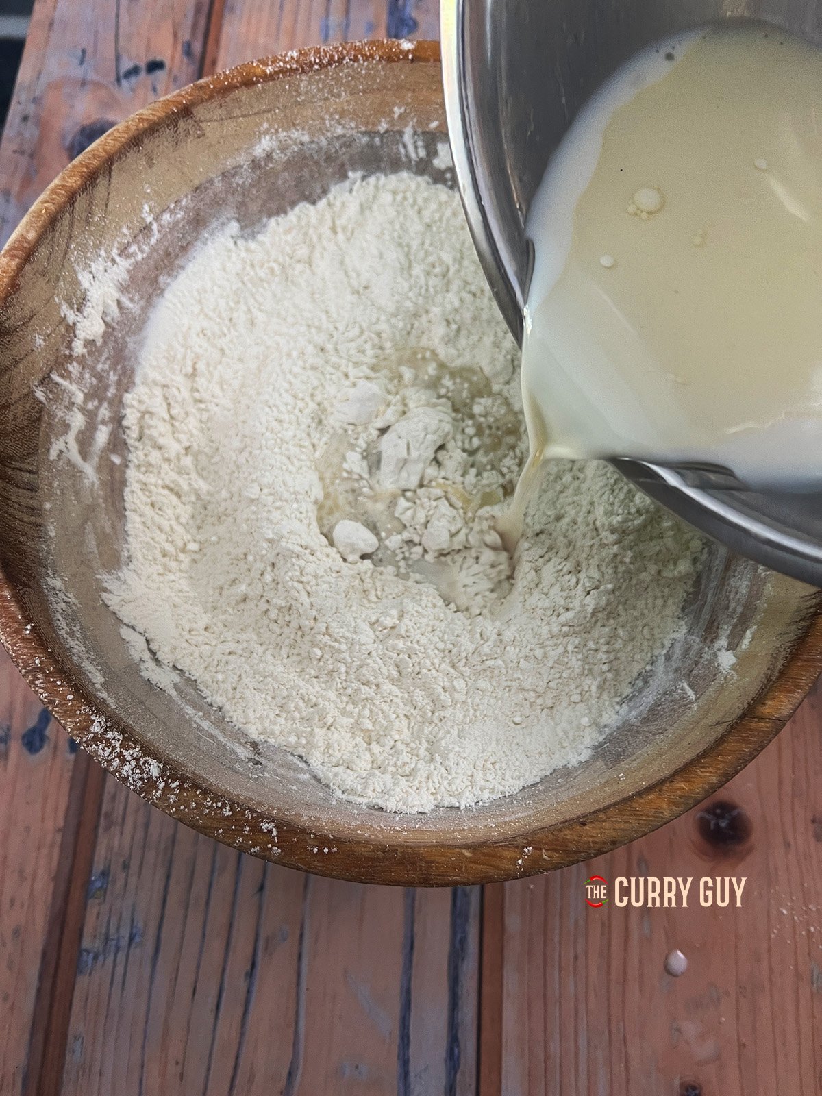 combining the wet and dry ingredients together. 