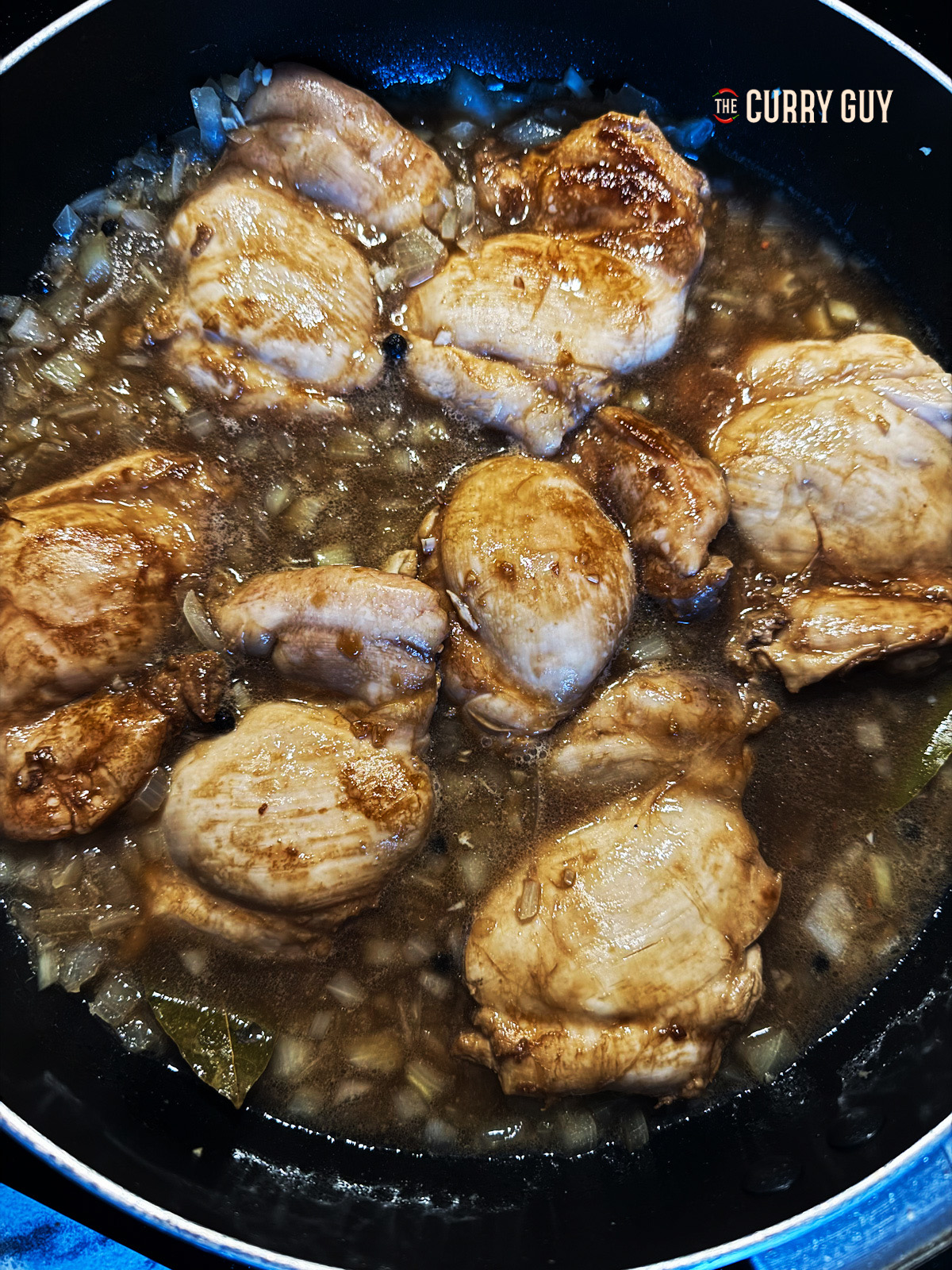 Sauce simmering with chicken 