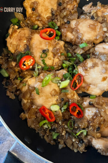 Chicken Adobo served up in a pan.