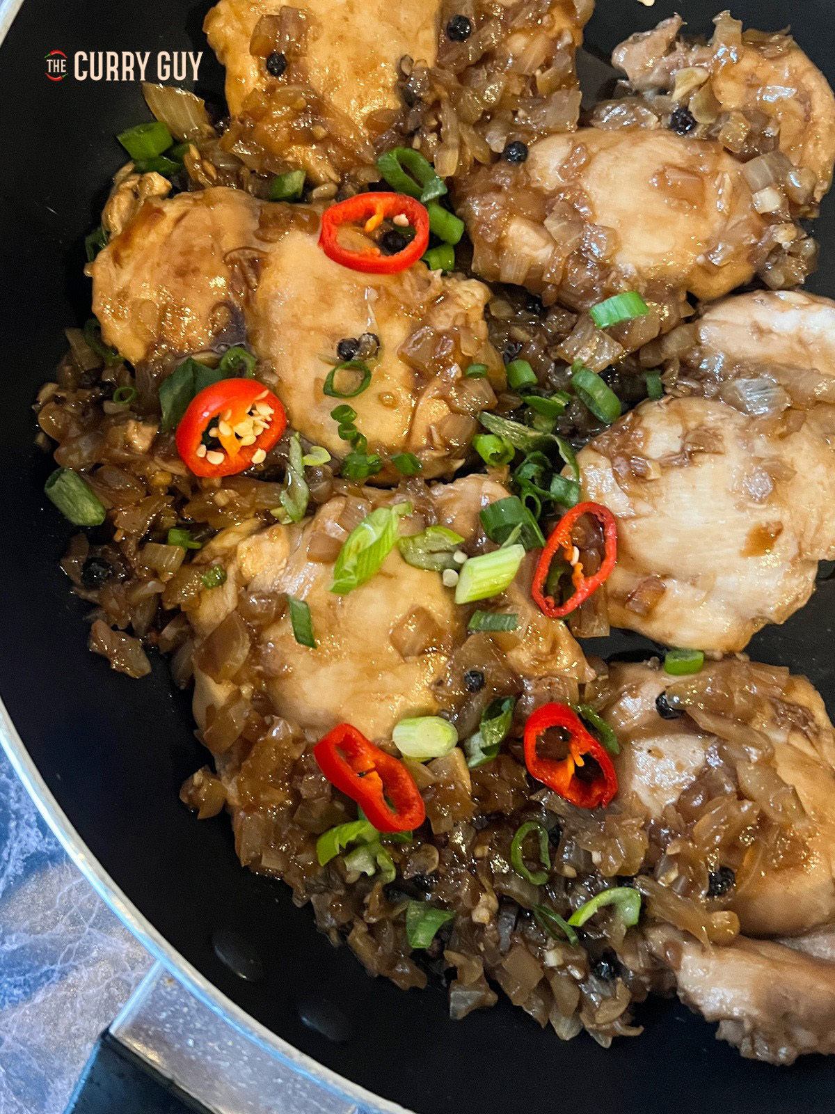 Chicken Adobo served up in a pan. 