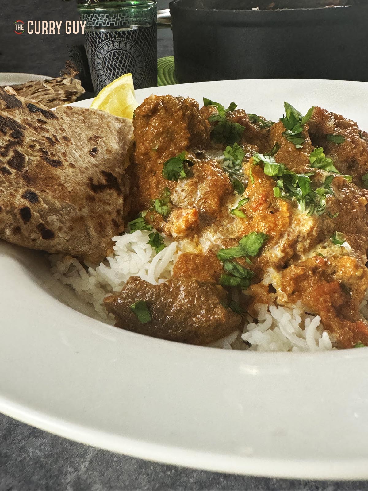 Beef tikka masala on a serving plate with chapatti.