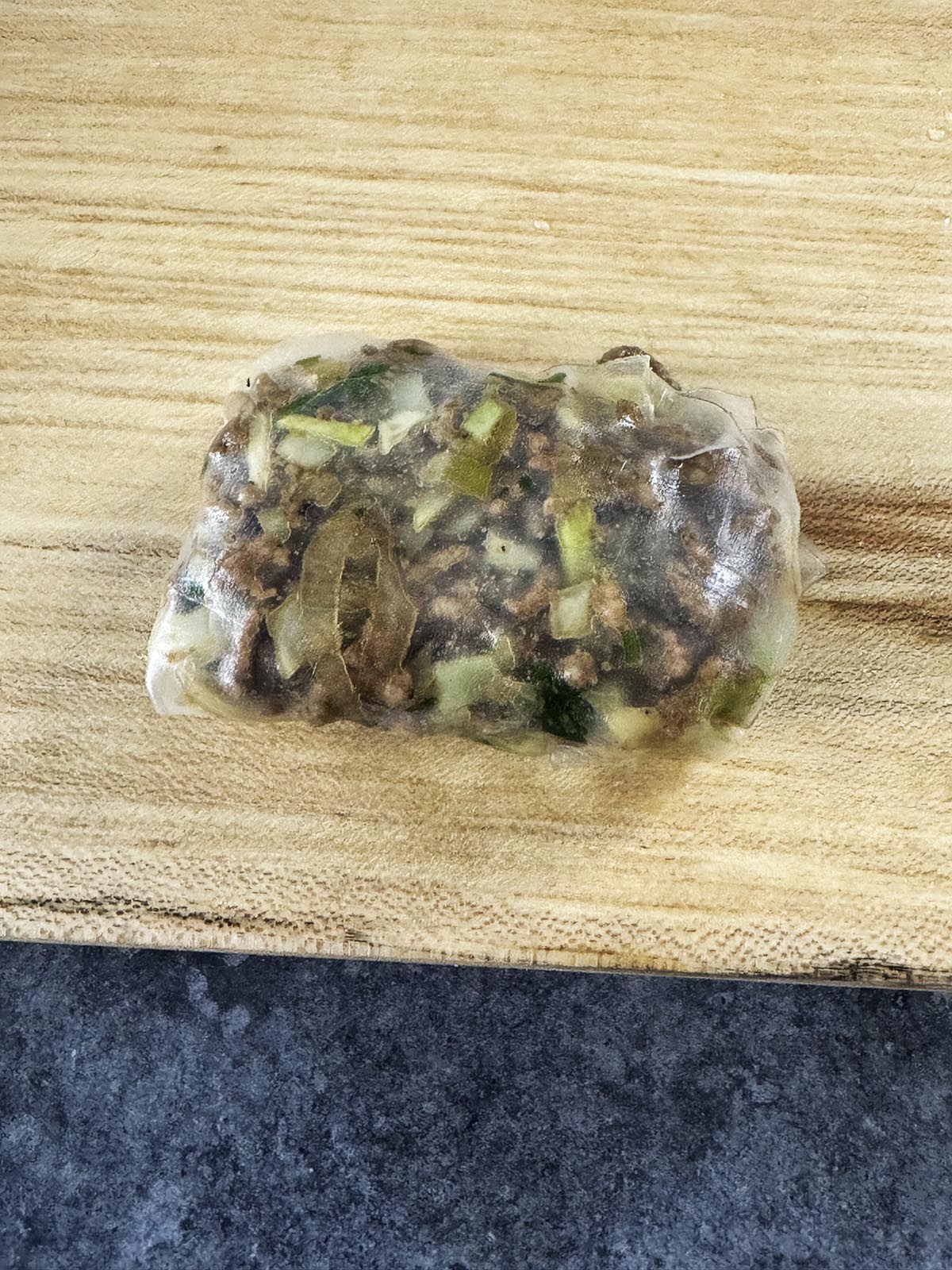 Meat wrapped in rice paper.