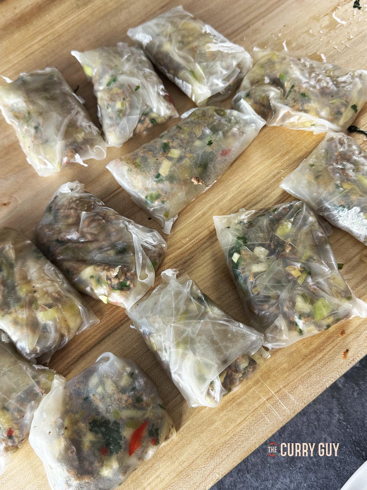 The wrapped dumplings ready to fry.