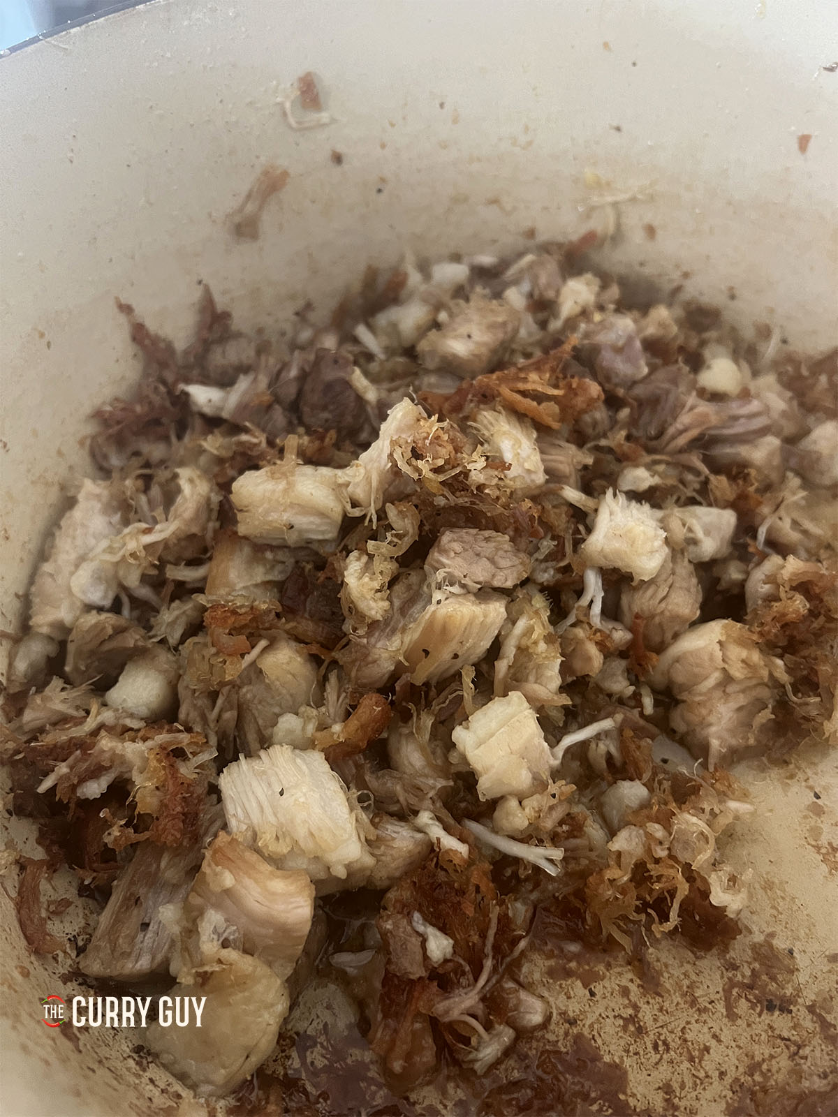 Frying the pork belly pieces in oil