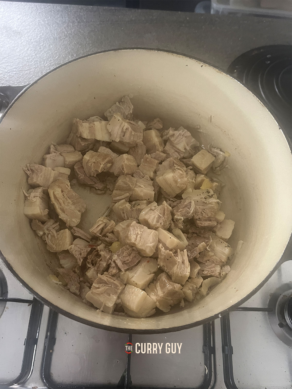 The cooked pork belly pieces in the pan