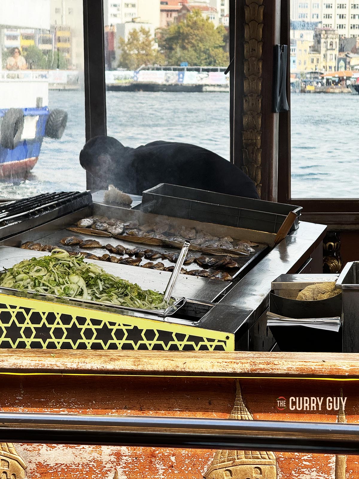 Fish cooking on one of the boats.