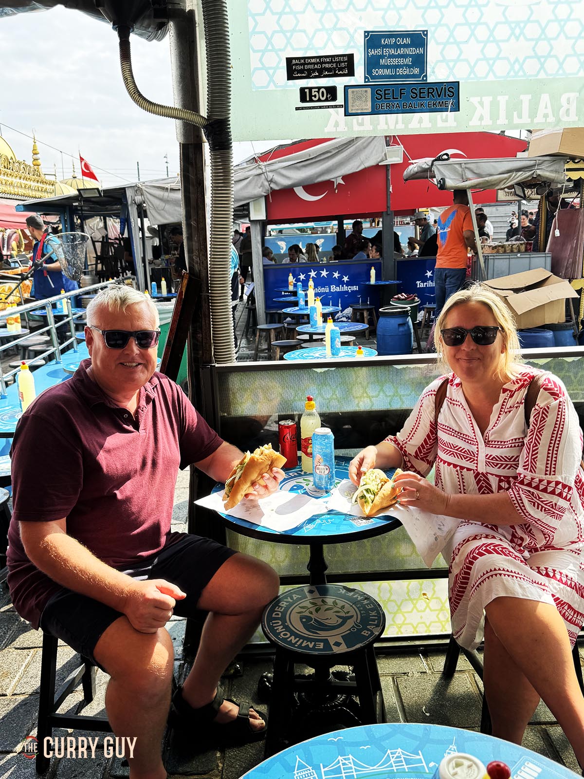 My wife and I dining at one of the fish sandwich boats.
