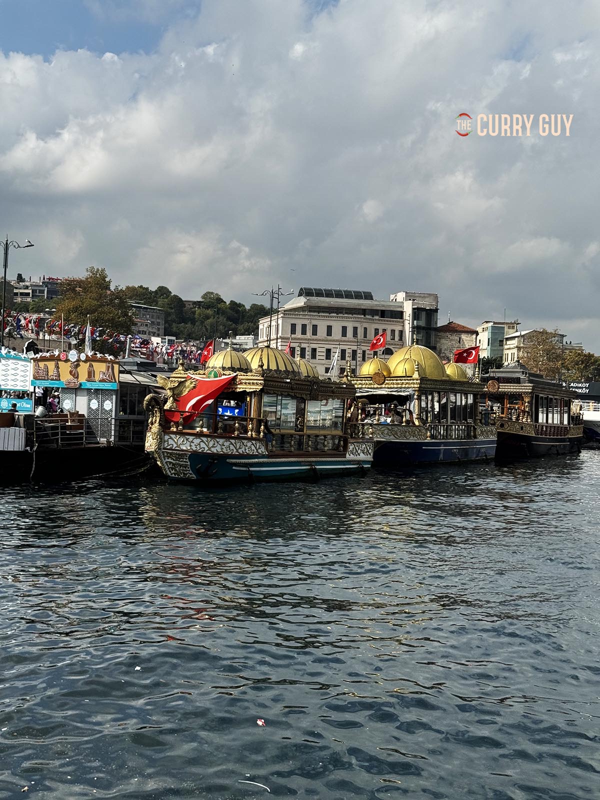 Three traditional boats where the fish sandwiches are prepared.
