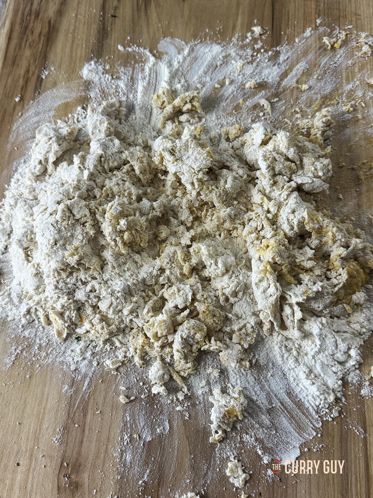 Mixing the eggs, flour and salt together.