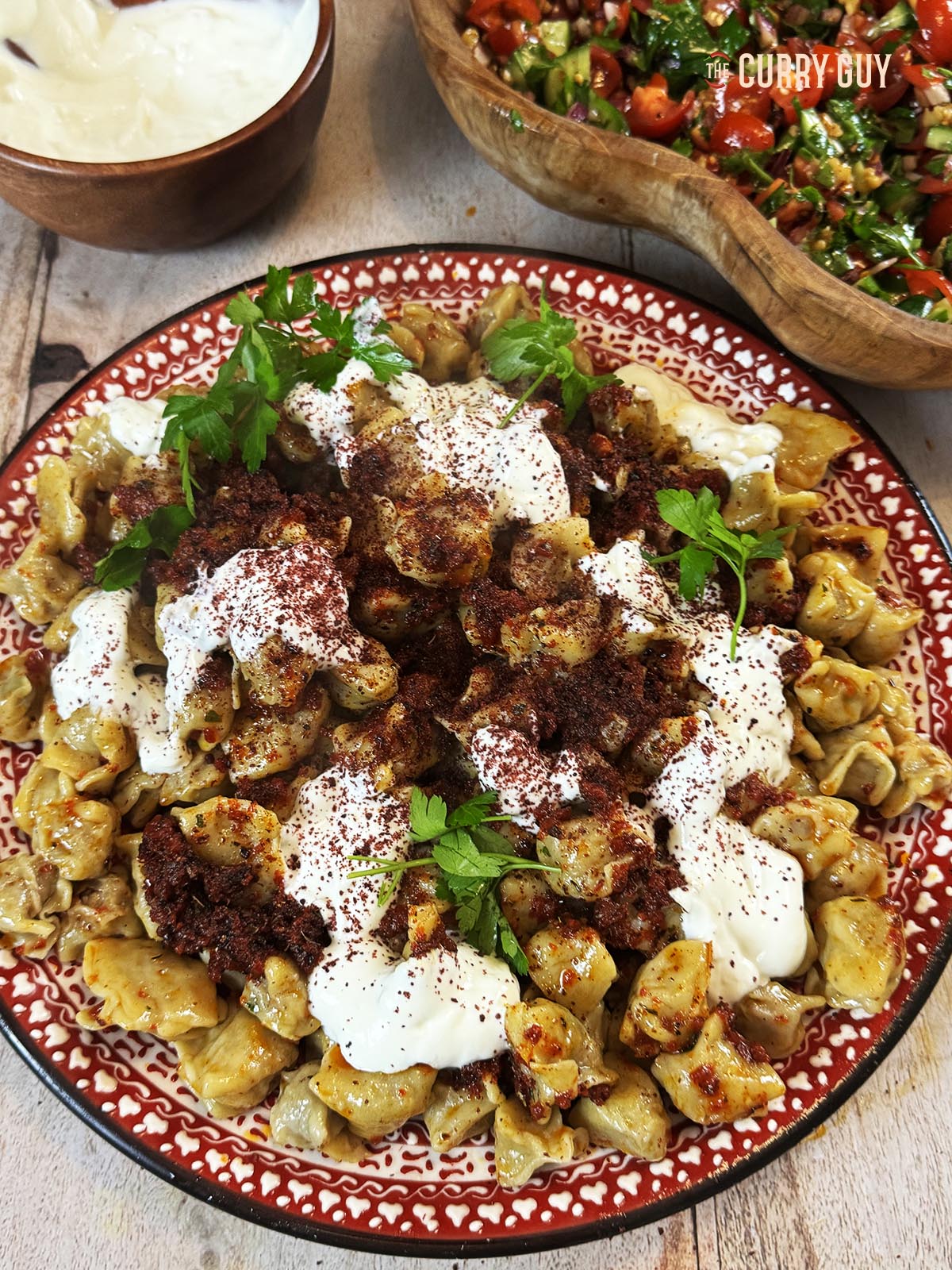 The dumplings using this manti recipe. All topped with hot red pepper paste and garlic yoghurt.
