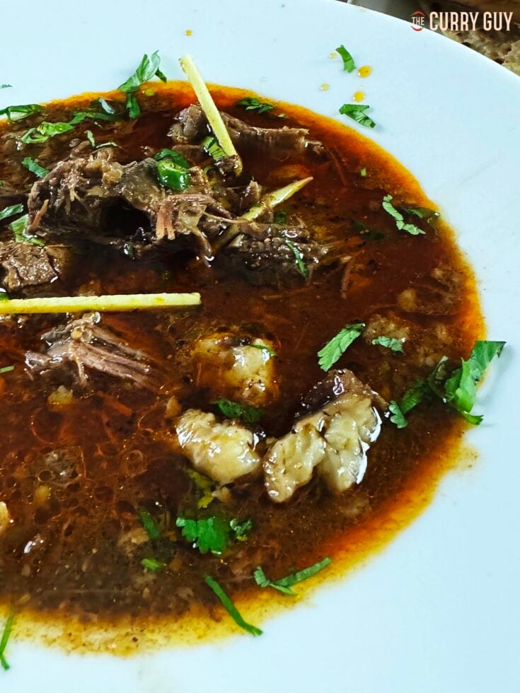 Beef nalli nihari in a serving dish.