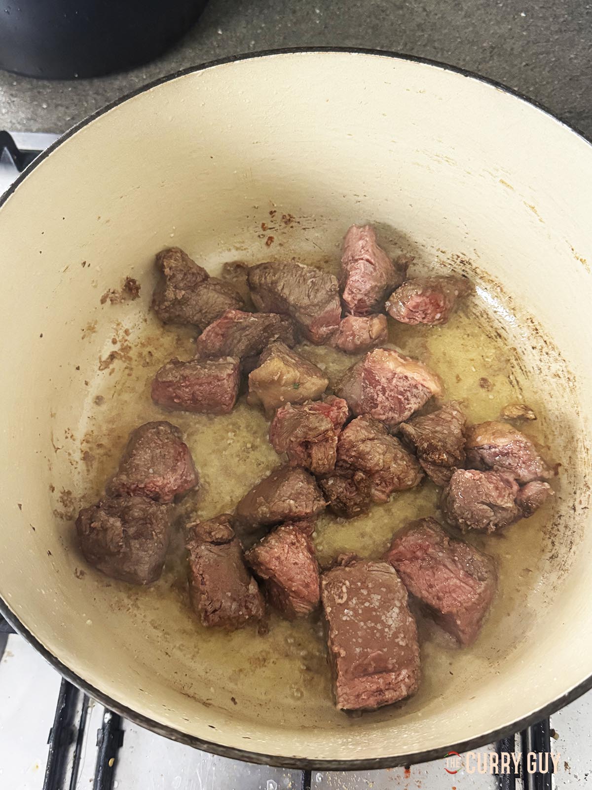 Fry the beef in small batched to brown it.