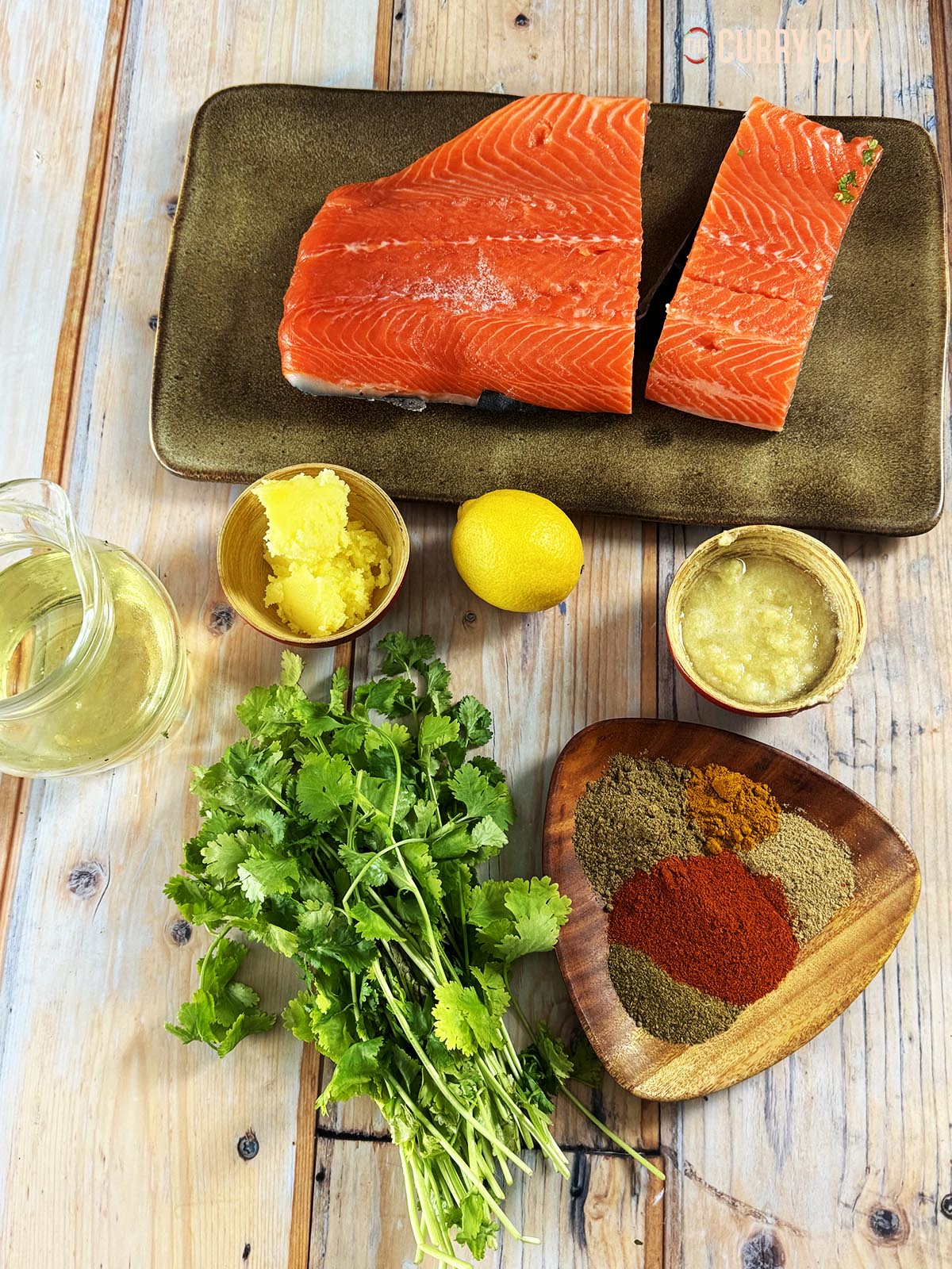 The ingredients for the recipe on a countertop, ready to prepare.