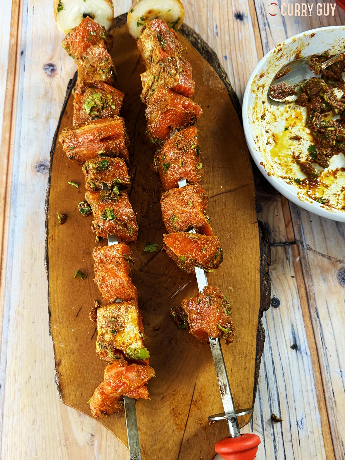 The salmon skewered and ready to place in the tandoor oven.