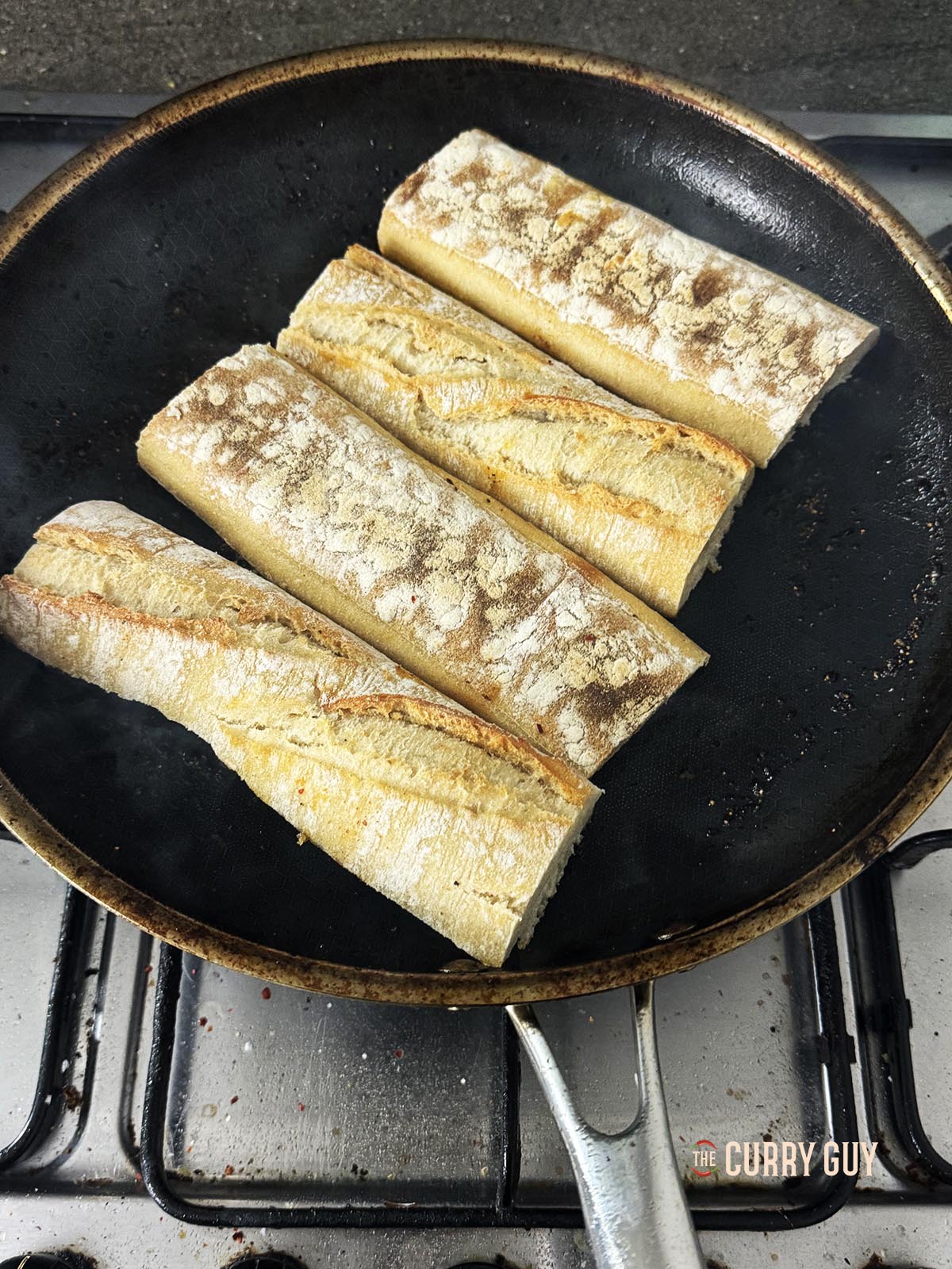 Toasting the break in a little olive oil in the pan.