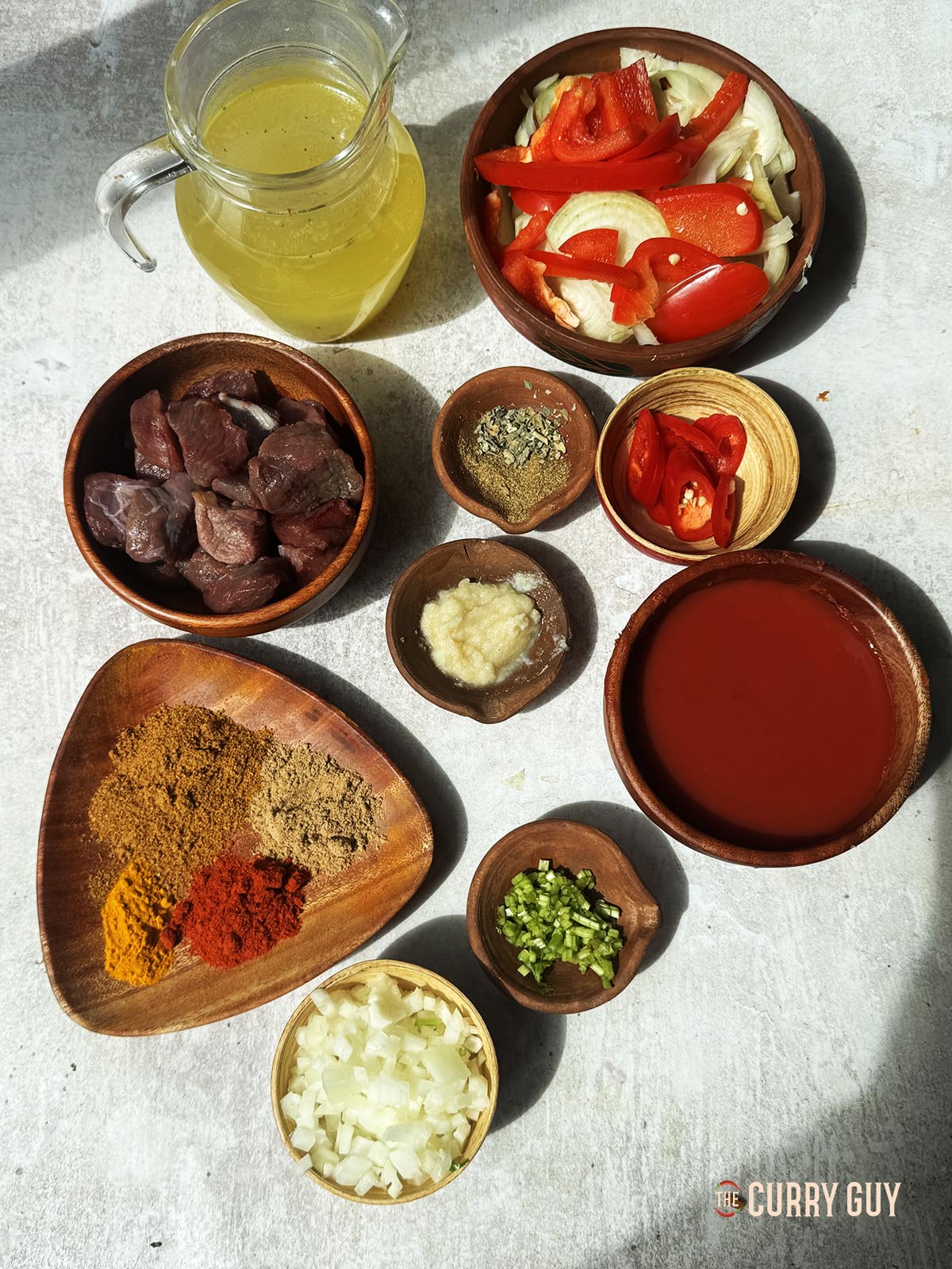 The ingredients for the curry laid out on a countertop.