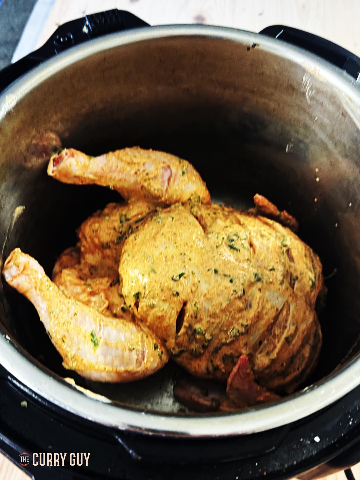 The chicken in the slow cooker. 