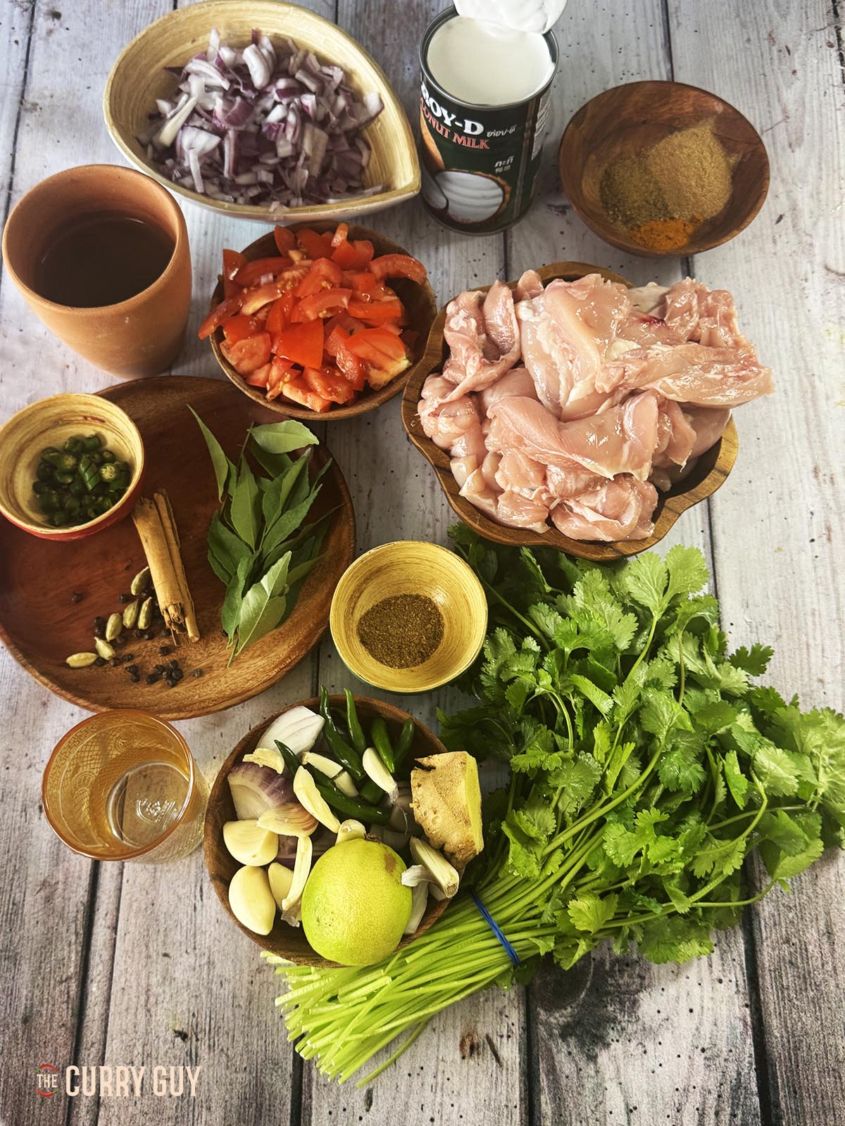 The ingredients for the recipe on a countertop and ready to add to the curry.