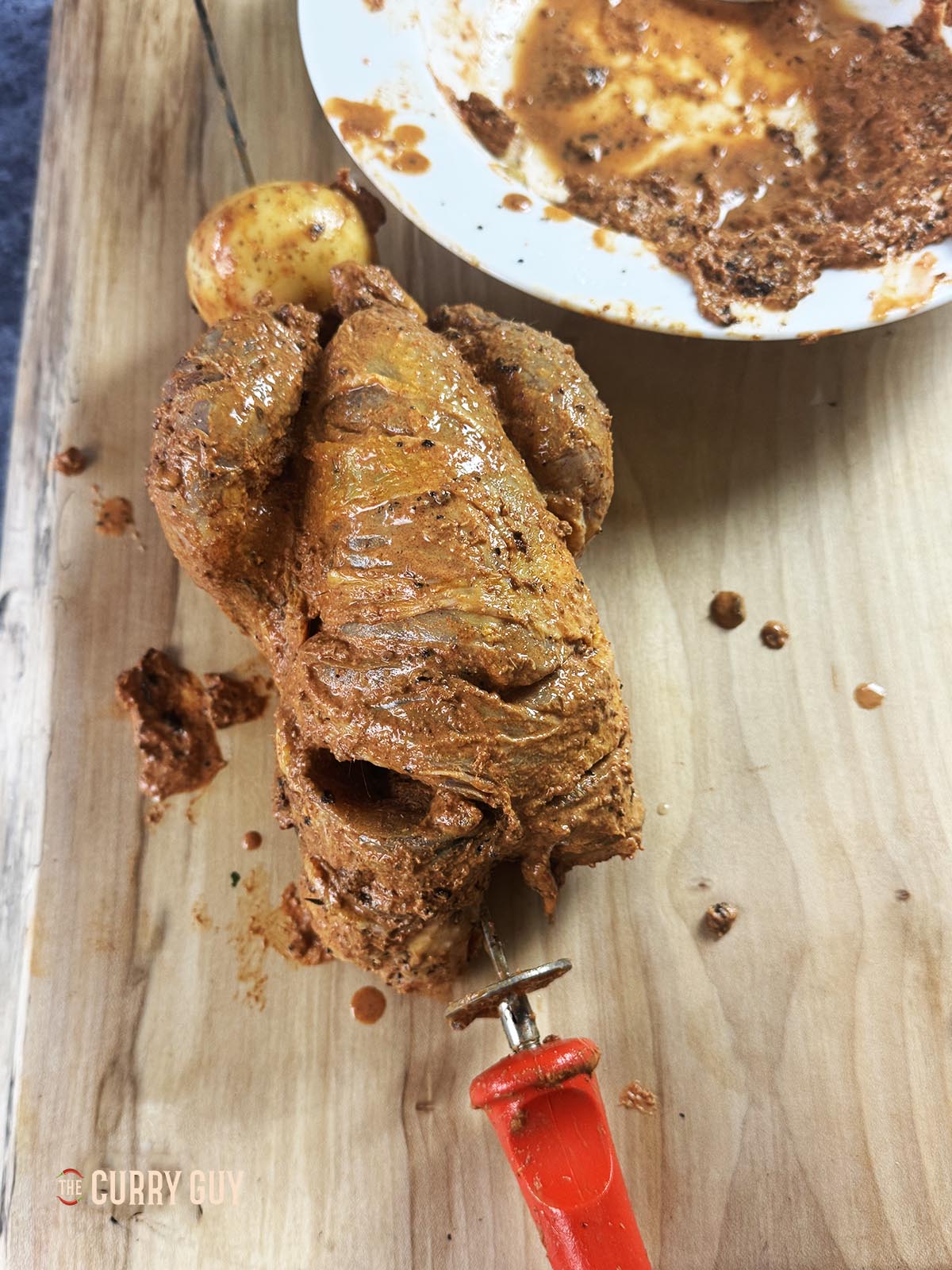The pheasant skewered and ready for the tandoor oven.
