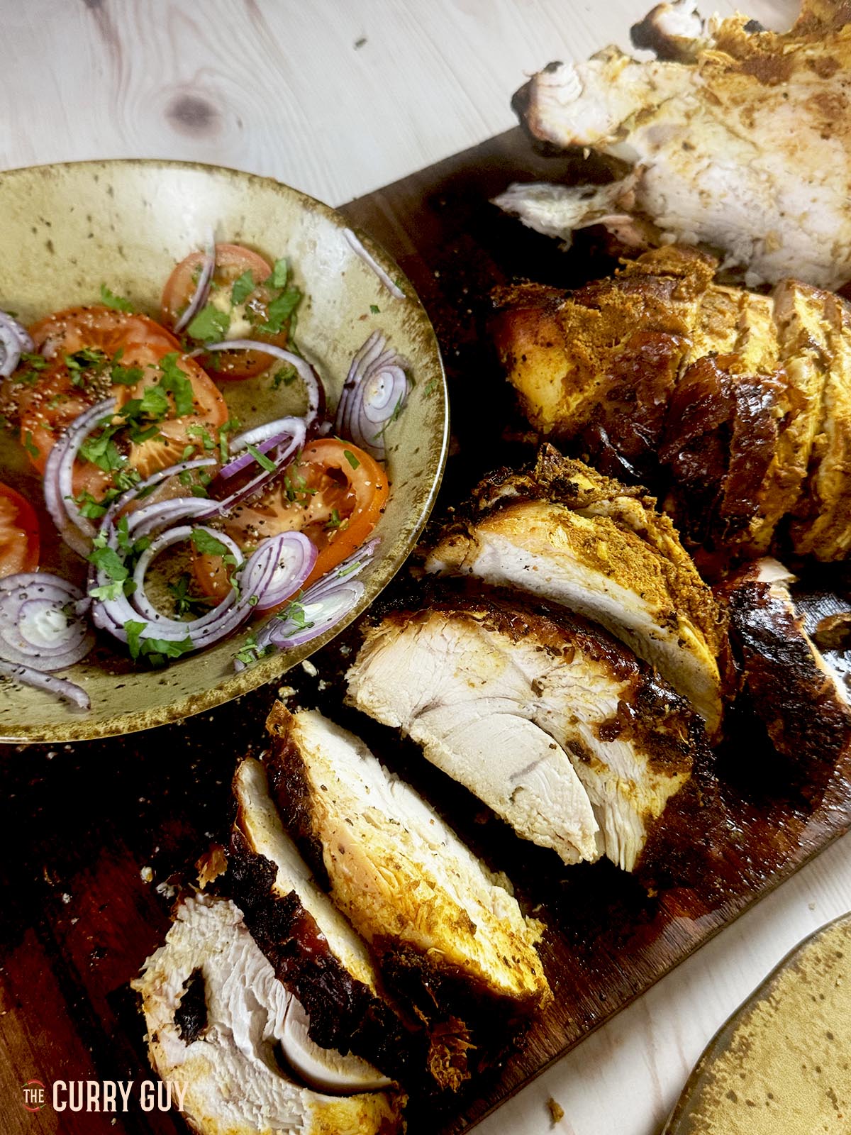 The turkey sliced and ready to serve.