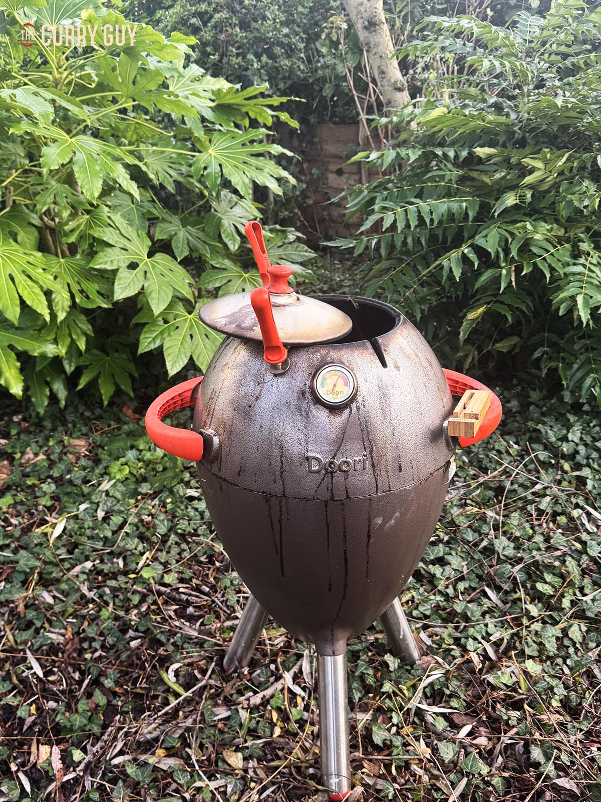 Cooking the turkey in the tandoor oven.