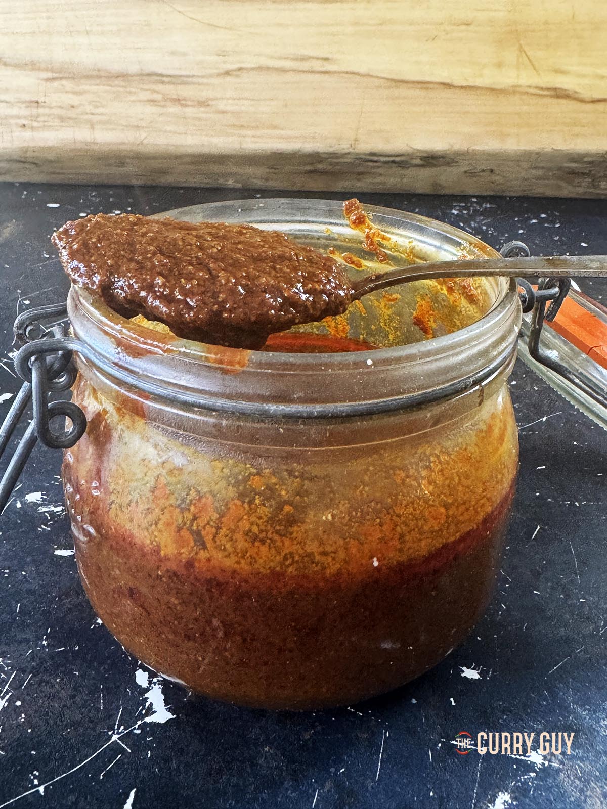 A spoonful of Madras curry paste.