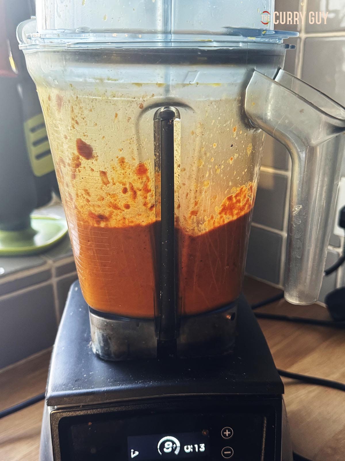 Blending the sauce ingredients until smooth.