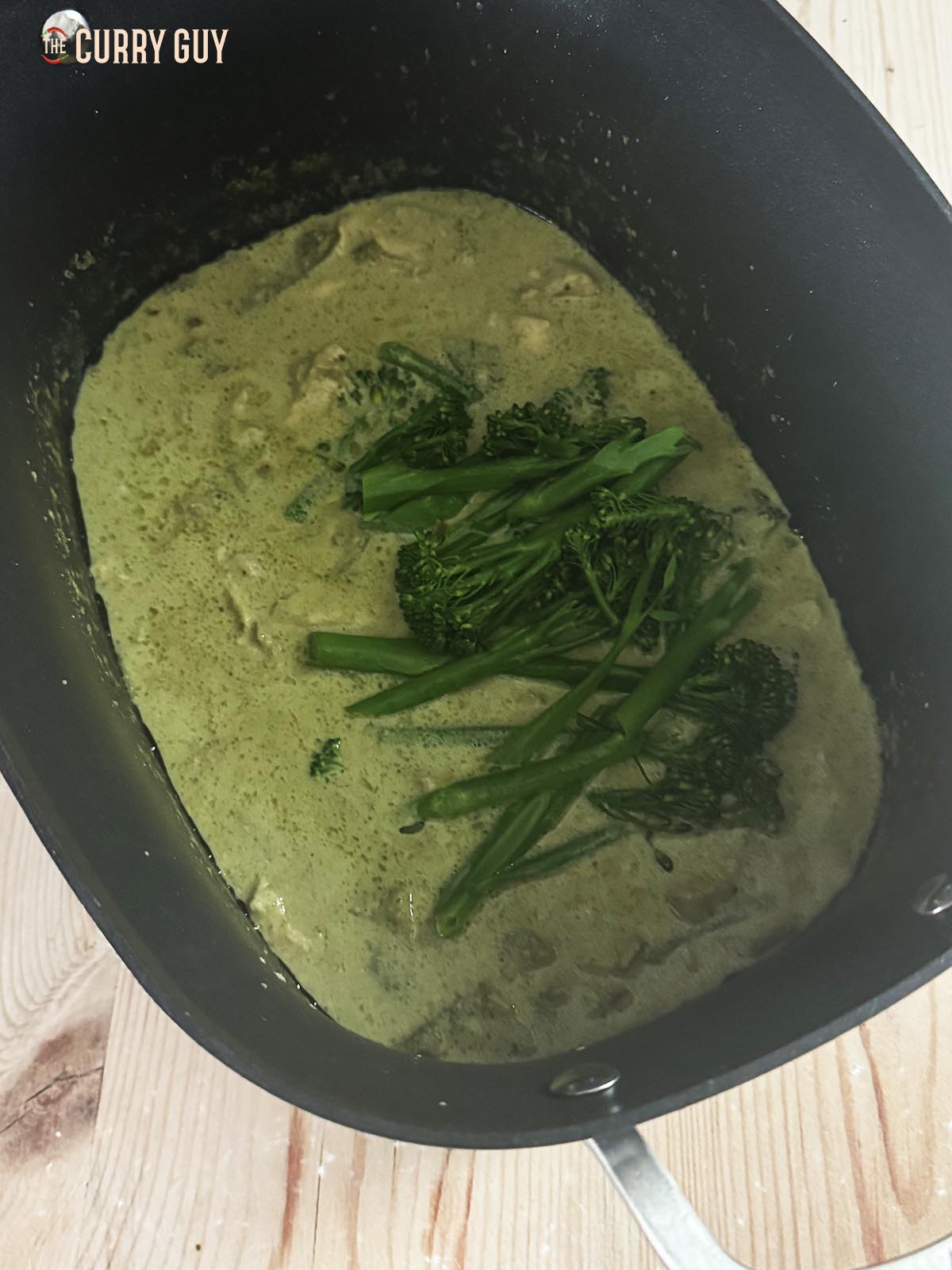 Adding steamed vegetables, fish sauce and lime juice before serving. 