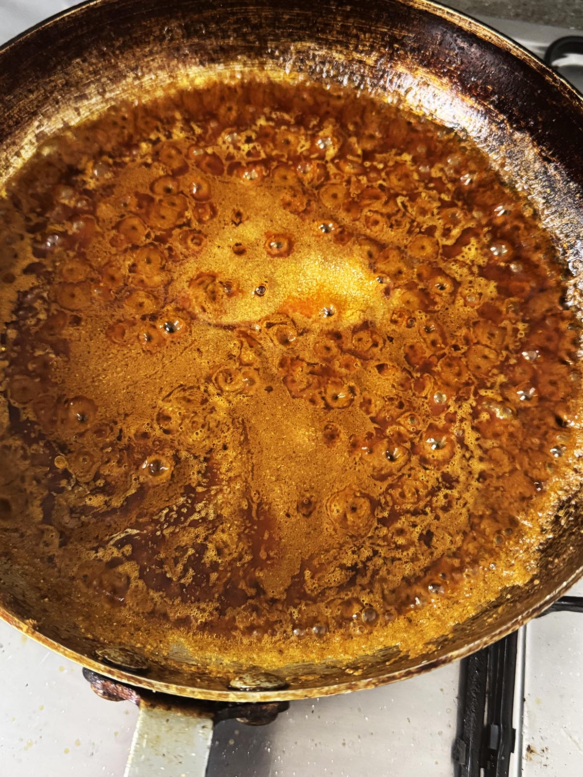 Adding the oil to the pan.