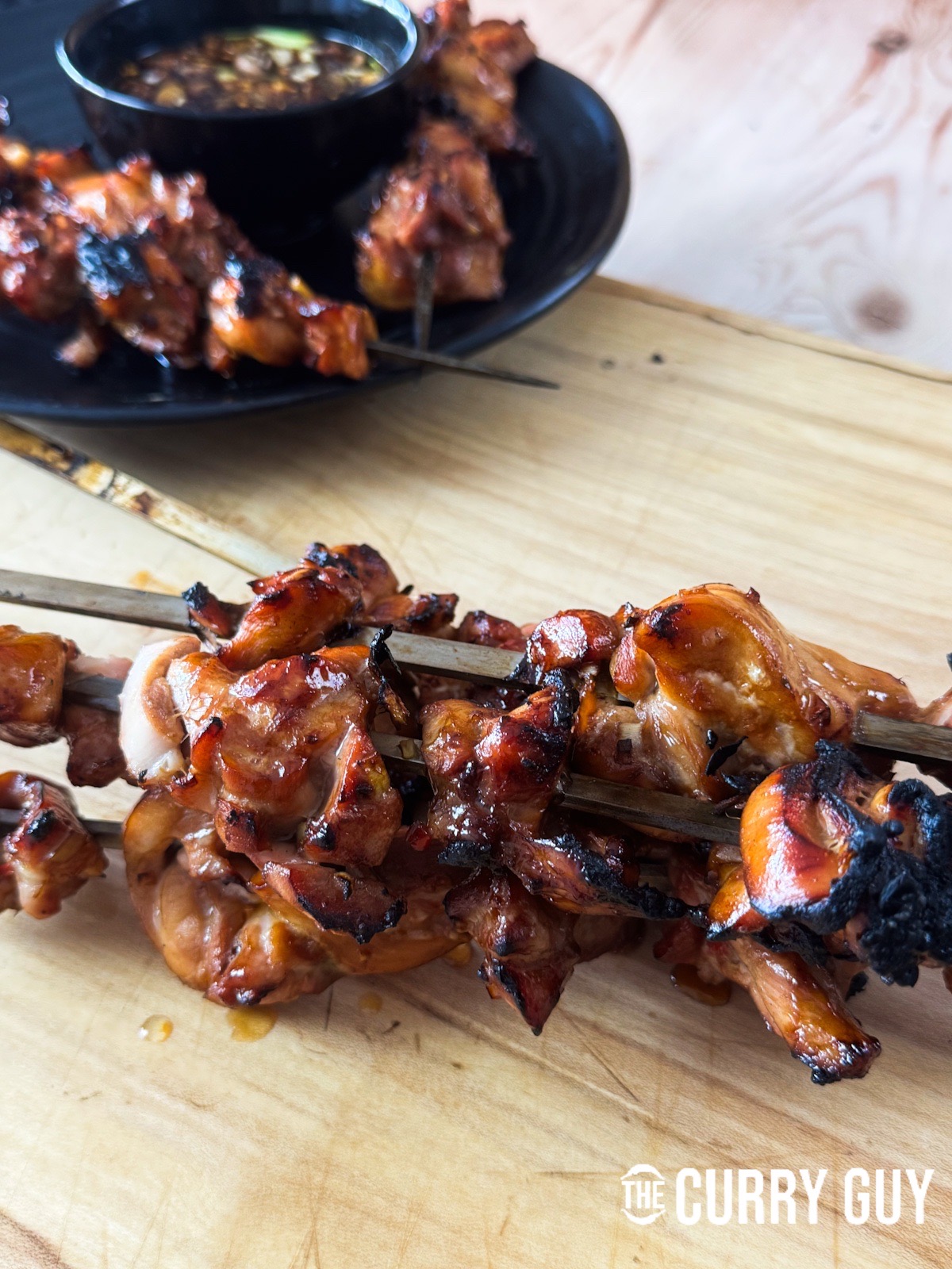 The cooked chicken resting on a serving platter.