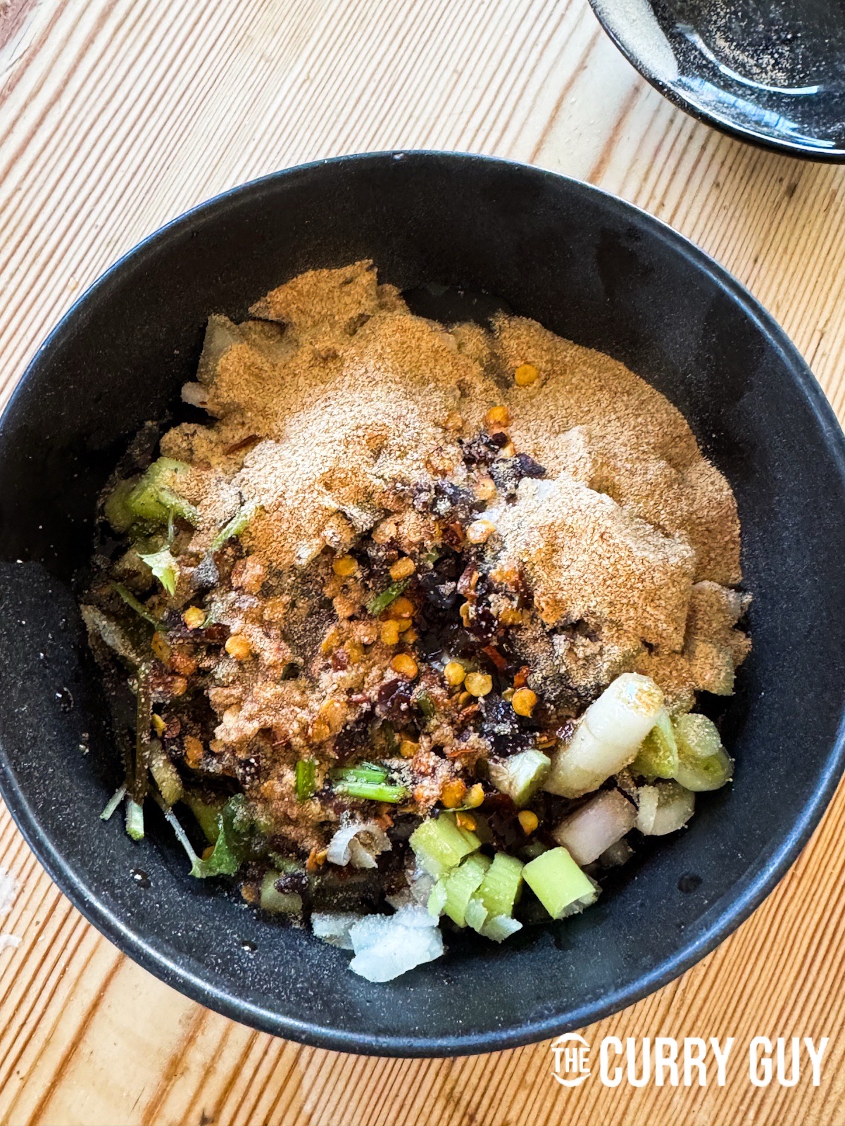 All of the ingredients for the sauce in a bowl.