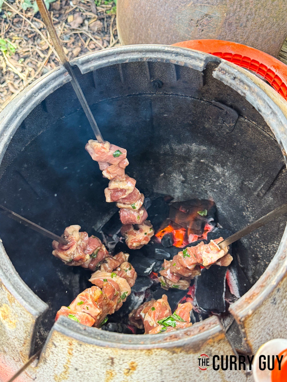 The meat skewers in the tandoor oven.