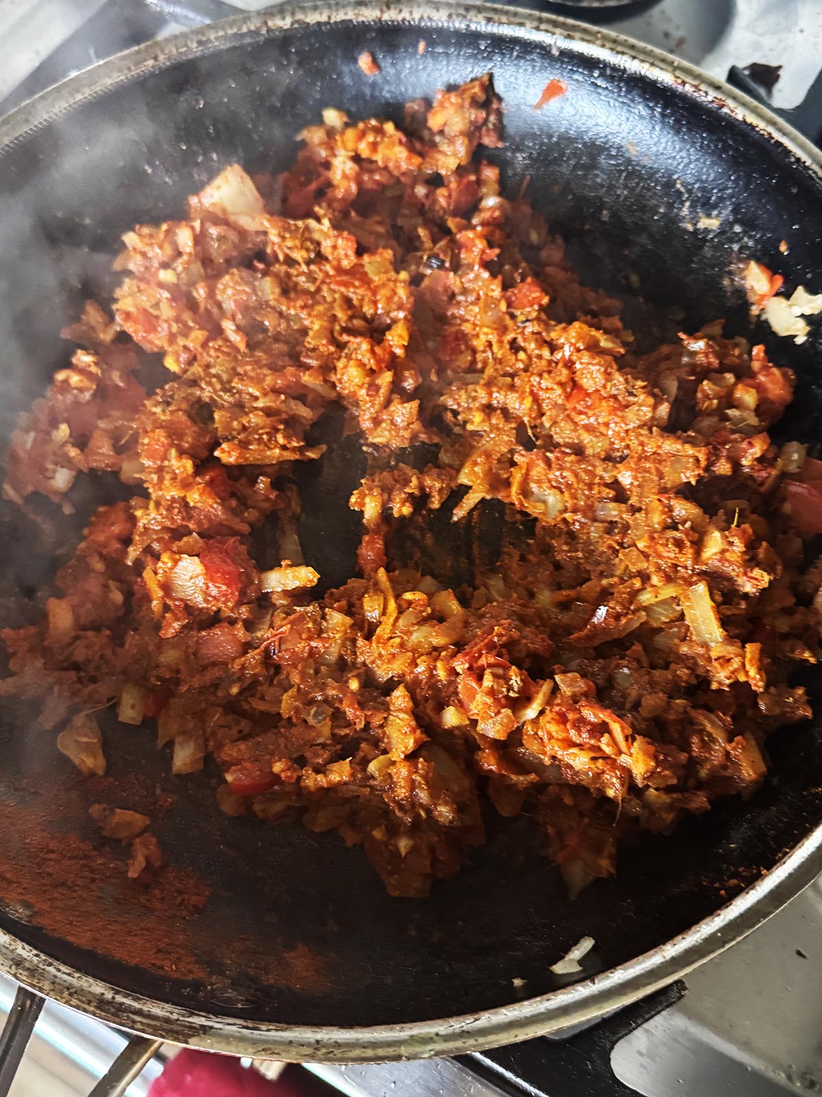 The onion mixture with spices ready to add to the dal.