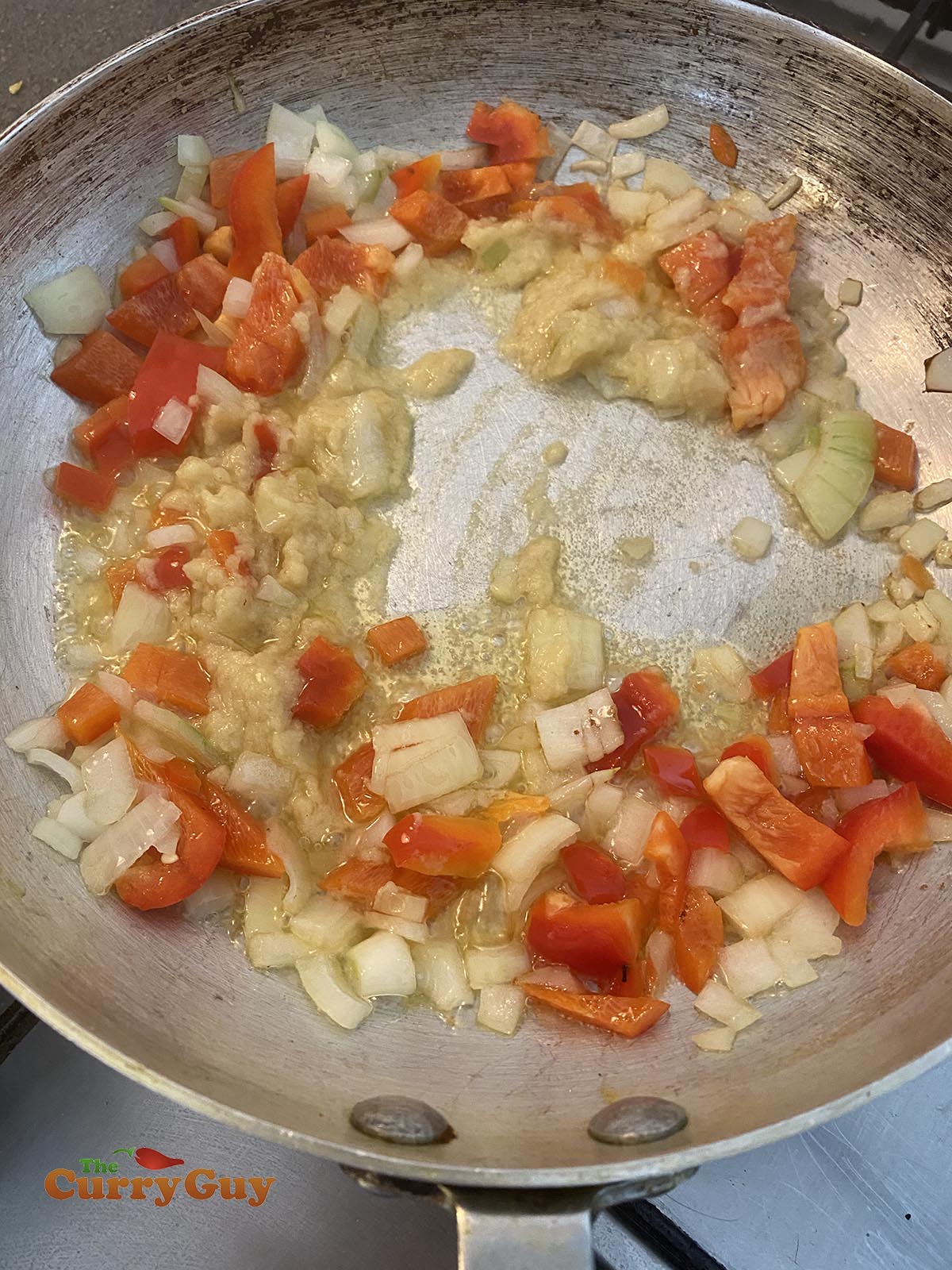 frying onion and bell peppers