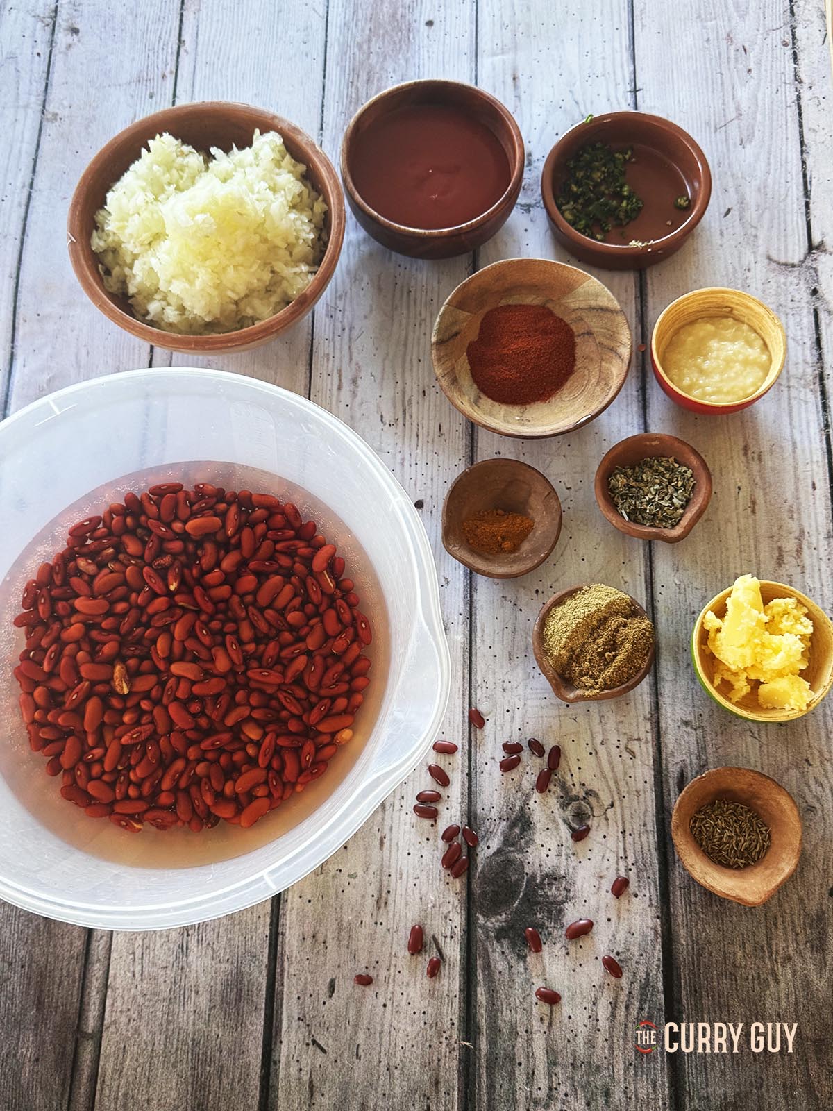 The ingredients for the rajma, laid out on a countertop ready to use.