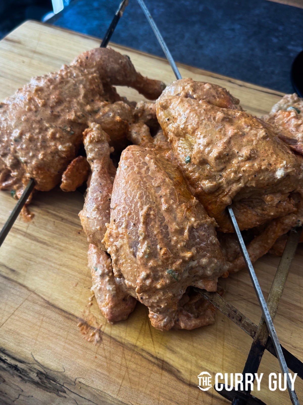 The chicken skewered and ready for the tandoori oven.