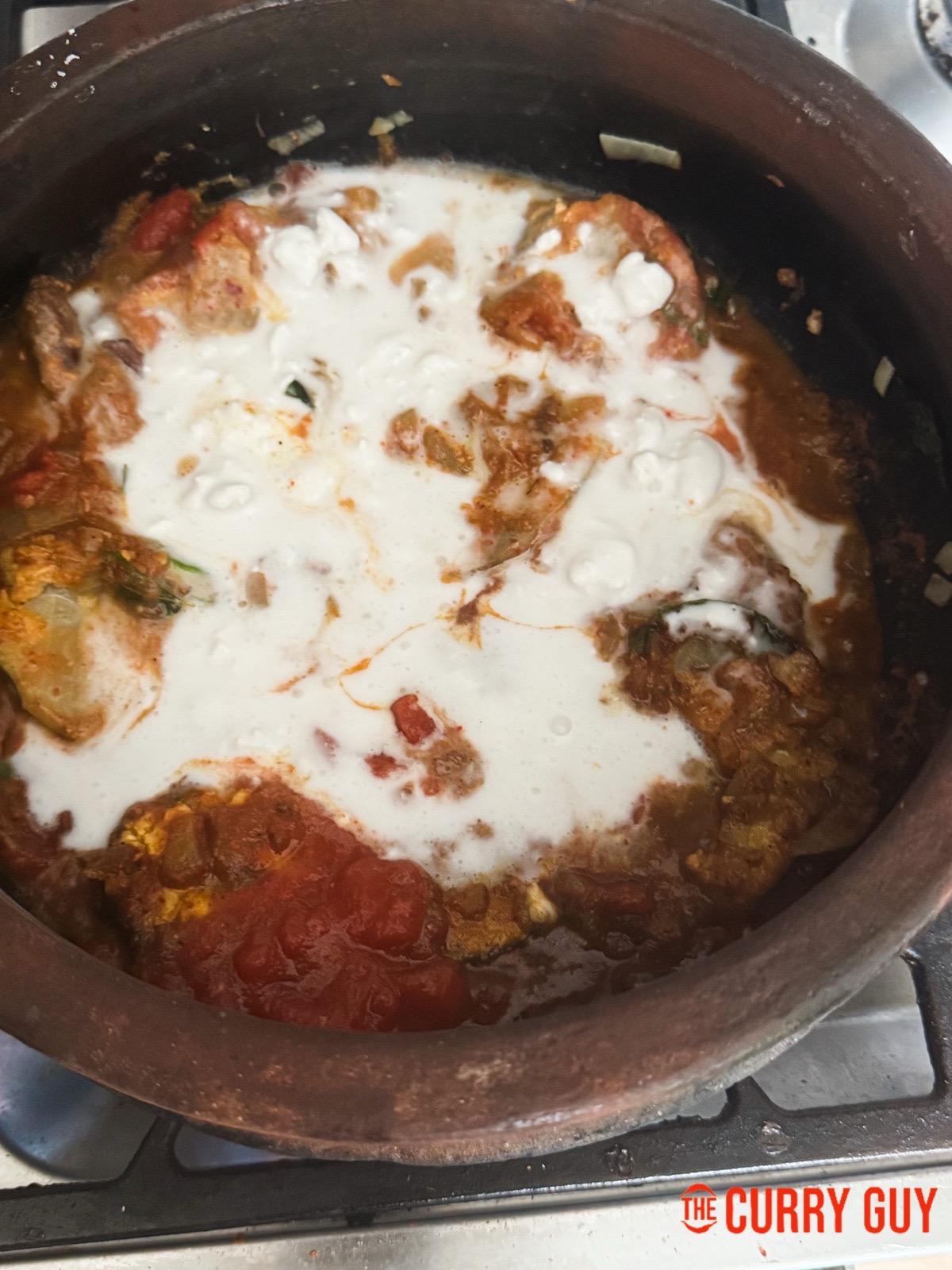 stirring in the coconut milk.