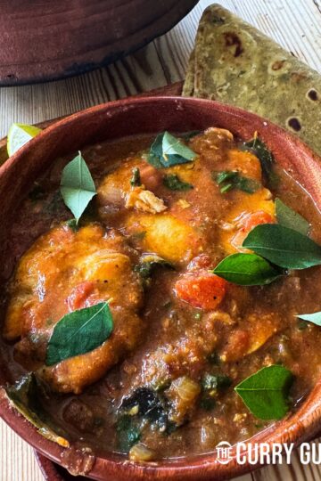 Goan fish curry in a serving bowl.