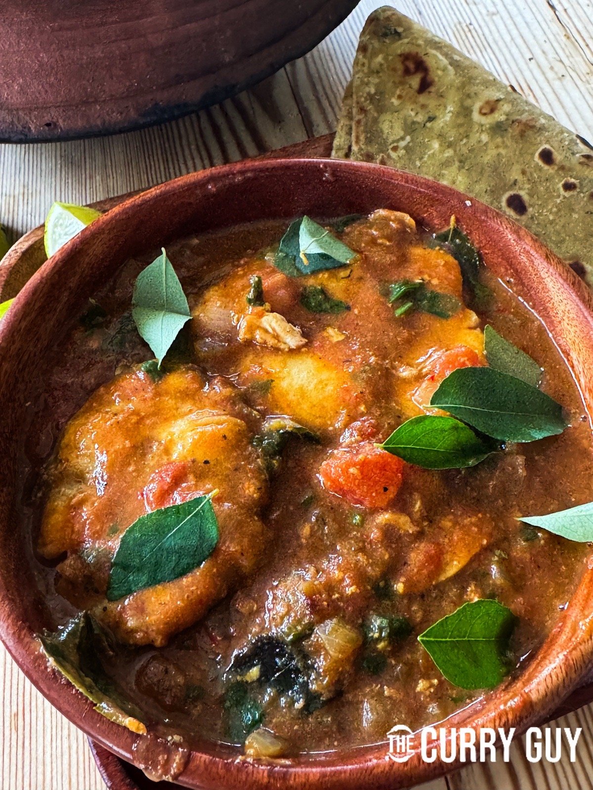 Goan fish curry in a serving bowl.