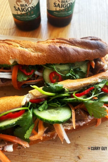 Pork banh mi all served up with two beers.