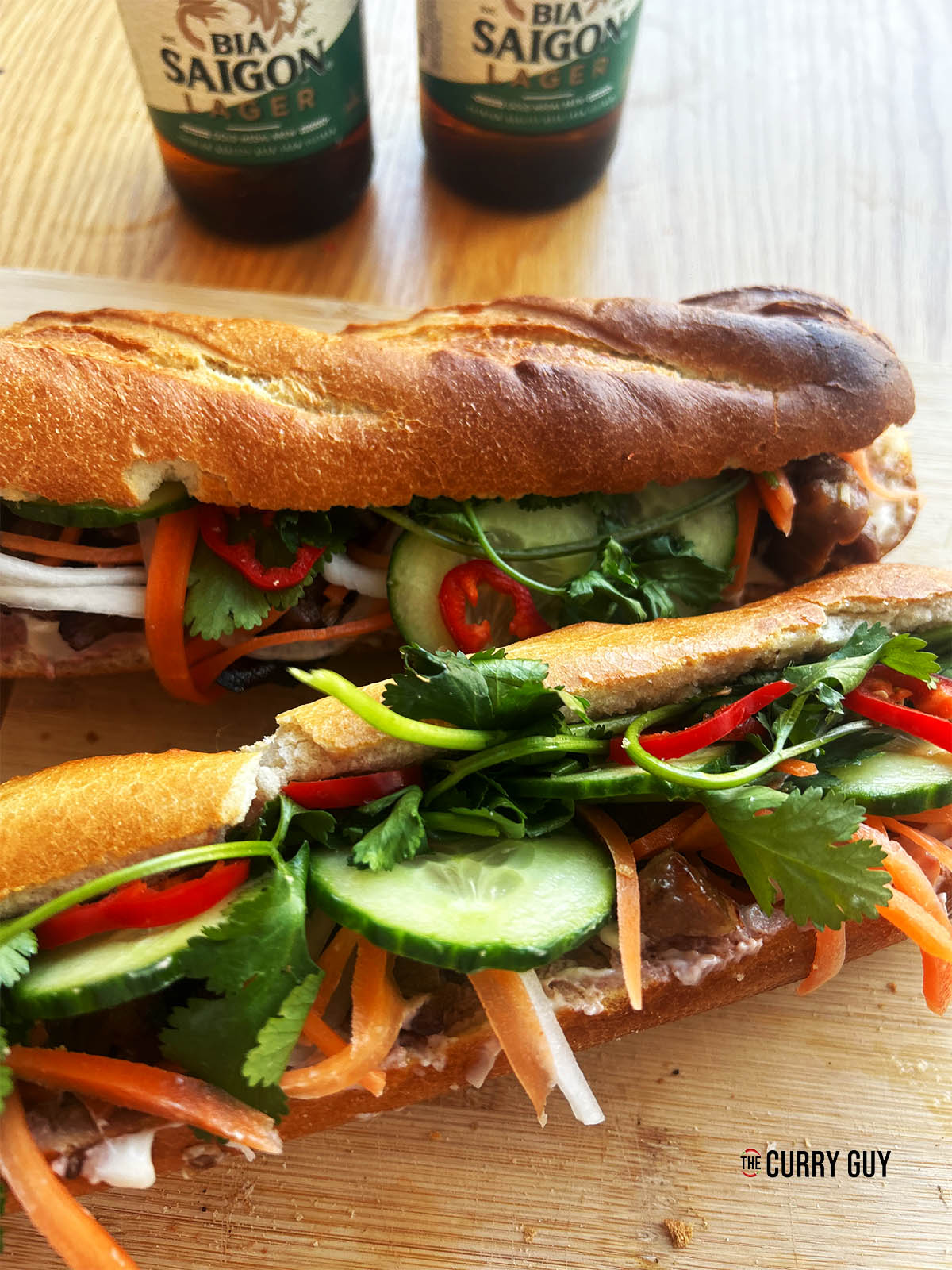 Pork banh mi all served up with two beers.
