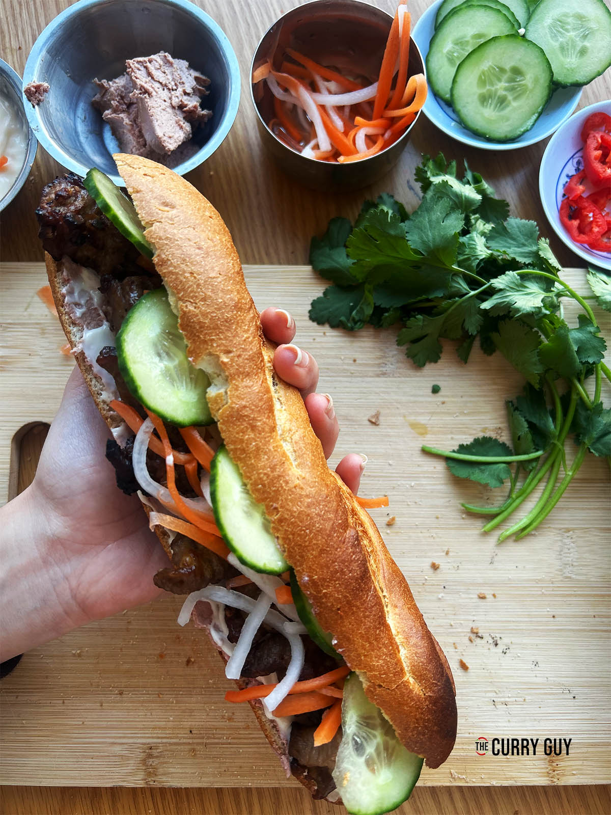 The banh mi filled with lots of delicious ingredients.
