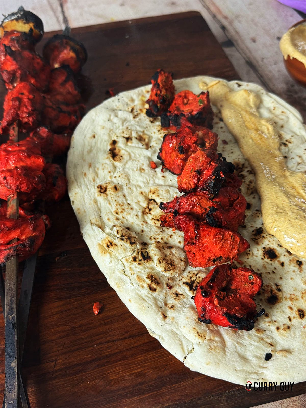Light chicken tikka on a naan.